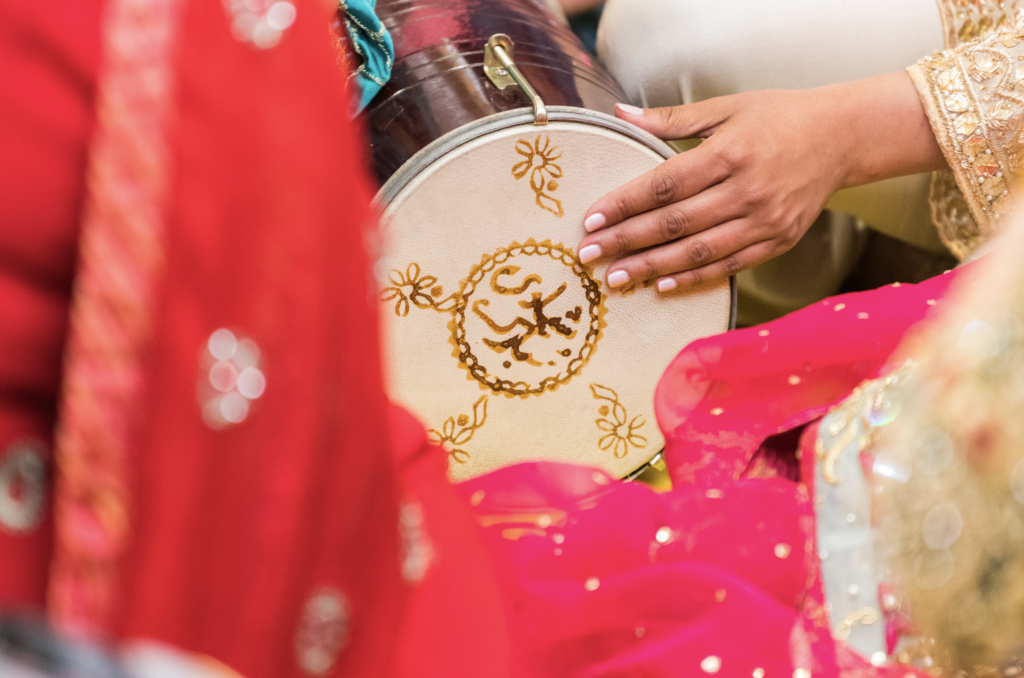 Hand drum called dohl being played at dohlki, a muslim wedding tradition